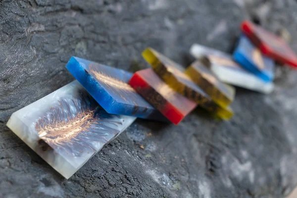 casting epoxy resin Stabilizing pine cone color full abstract art blur background, Beautiful texture of a wooden blanks