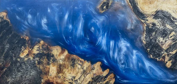 Лиття епоксидної смоли Стабілізатор лопаті Афзелі деревини синього кольору abs — стокове фото