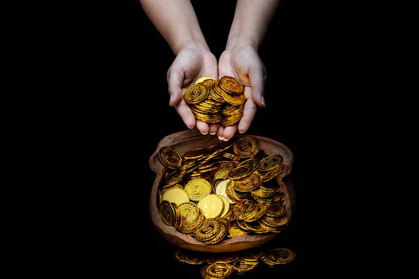 Stacking gold Coin in broken jar on black background, Money stack for business planning investment and saving future concept