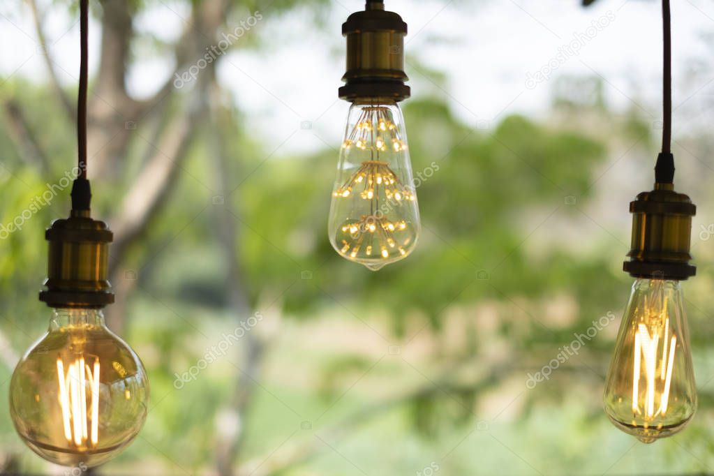 classic retro incandescent led electric lamp on blur background,Vintage light bulb