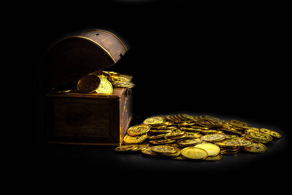 Stacking Gold Coin in treasure chest  on black background