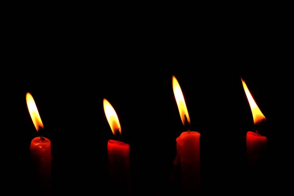 Four Light Flame Candle Burning Brightly Black Background — Stock Photo, Image