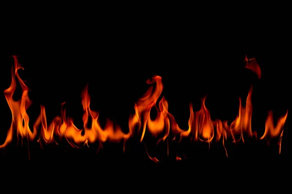 火災炎抽象アート ブラックの背景に 燃えるレッド ホット火花上昇 燃えるようなオレンジ色の輝く飛行粒子 — ストック写真
