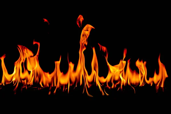 火焰在抽象艺术黑色背景 燃烧的红色热火花上升 火红的橙色发光的飞弹 — 图库照片