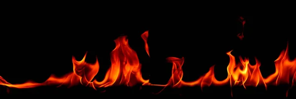 Feuer Flammen auf abstrakter Kunst schwarzen Hintergrund — Stockfoto