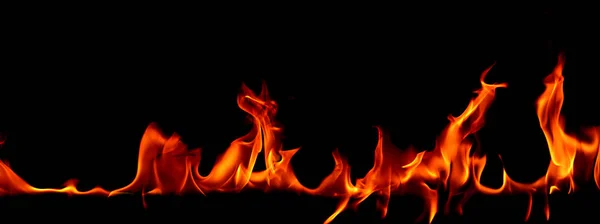 Tűz lángok az absztrakt művészet fekete háttér — Stock Fotó