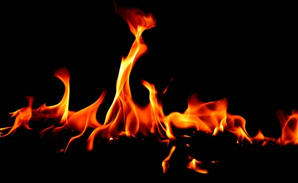 Fuego llamas en abstracto arte negro fondo — Foto de Stock