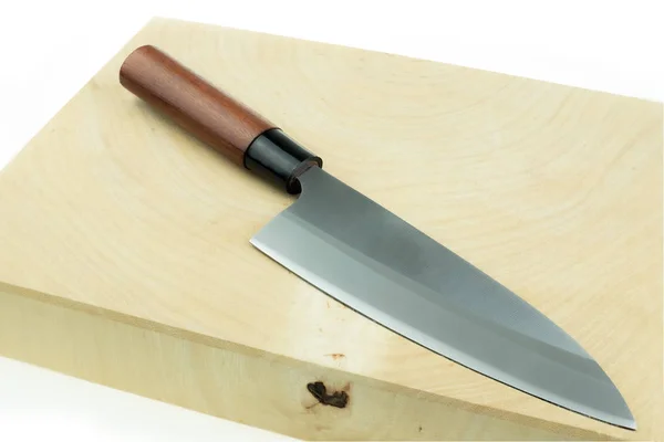 Kitchen knife and wood butcher block countertop — Stock Photo, Image