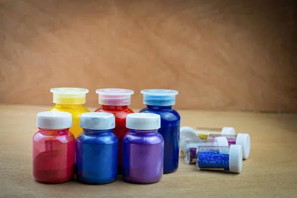 Mixing color epoxy resin in plastic cup — Stock Photo, Image