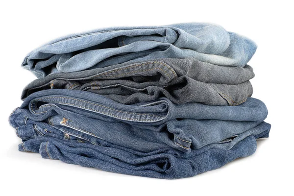 Stack Olika Nyanser Gamla Jeans Byxor Vit Bakgrund — Stockfoto