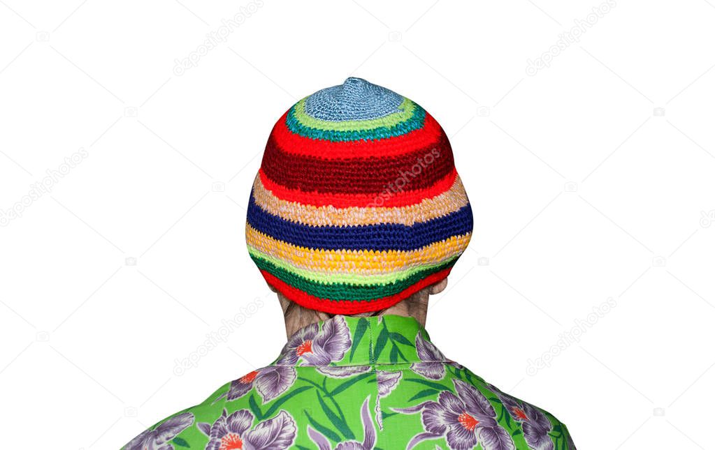 an elderly woman dressed in a knitted cap on his head