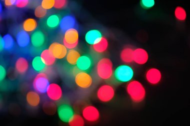 Ufuk soyut çok renkli bokeh arka plan ışıklar. Sihirli patlama star parçacıkları ile