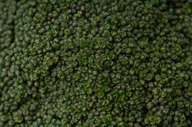 Taze yeşil brokoli dokusu makrosu - brokolinin ayrıntıları. Sağlıklı gıda ve veganizm konsepti.