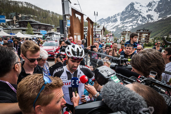 Cervinia, Italy 26 May 2018: Tom Dumoulin, Sunweb Team, attacked by journalists and photografers after the last montain stage of Tour of Italy 2018.