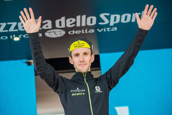 Prato Nevoso, Italy May 24, 2018: Simon Yates, Mitchelton Scott Team, on the podium celebrates to be the best climber of the Giro D'Italia 2018.
