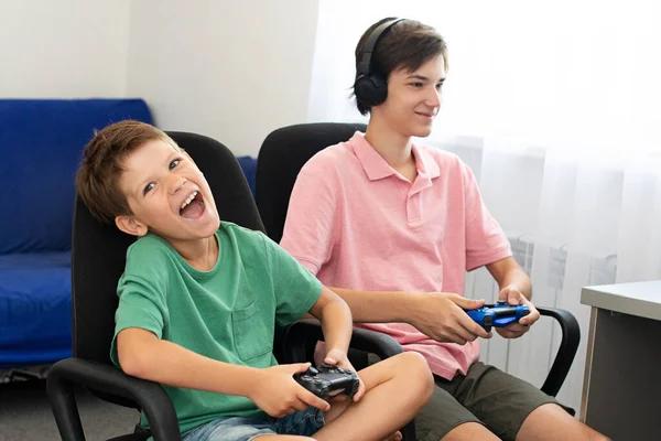 Teenager Boy Online Plays Computer Game Headphones Joystick Game Console — Stock Photo, Image