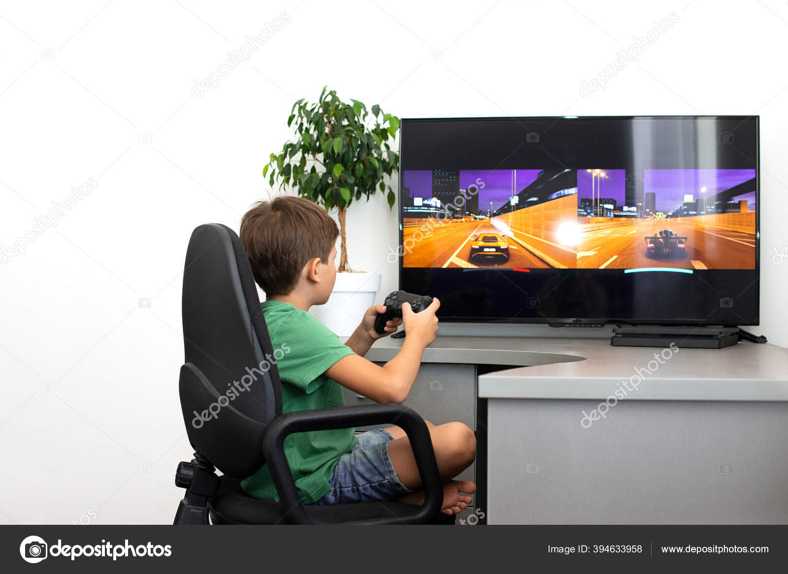 Teenager Boy Online Plays A Computer Game With Headphones And A