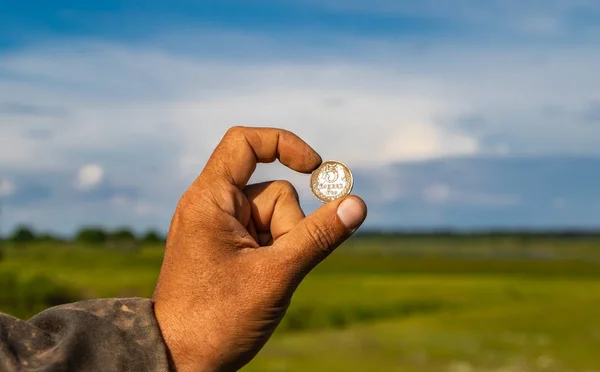 Archaeological finds, old coins found and removed from the ground.