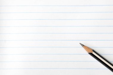 kurallı bir defterüzerinde kalem. Kopya alanı. Close. 