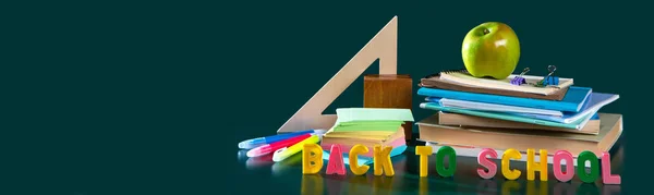 Banner. Inscription BACK TO SCHOOL. Still life with school supplies. Notebooks, notebooks, felt-tip pens, colored pencils, an apple. Colorful picture. Copy space — Stock Photo, Image