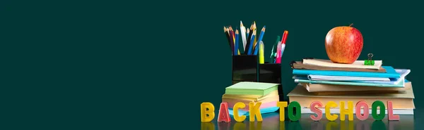 Banner. Inscription BACK TO SCHOOL. Still life with school supplies. Notebooks, notebooks, felt-tip pens, colored pencils, an apple. Colorful picture. Copy space — Stock Photo, Image