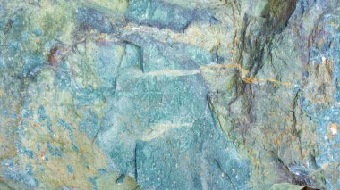 Mavi-yeşil Jasper 'ın taş dokusu. Turkuaz arka planda taş dokusu var. Metin için gabbro diabase arkaplan ve alan tasarım şablonu.