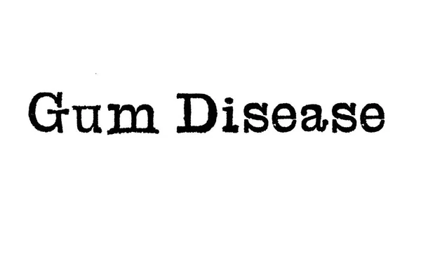 The words Gum Disease from a typewriter on a white background