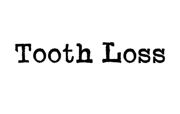 The word Tooth Loss from a typewriter on a white background