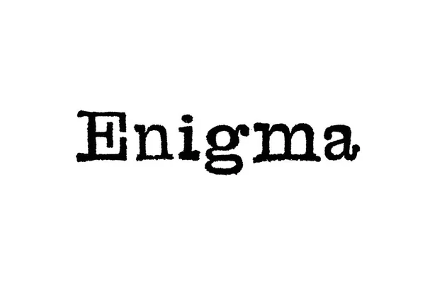 Palavra Enigma Uma Máquina Escrever Fundo Branco — Fotografia de Stock