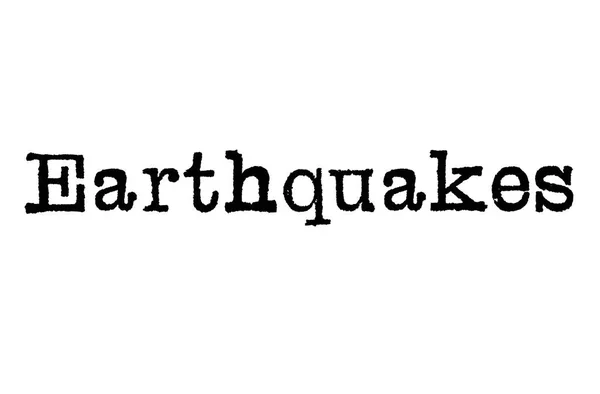 Beyaz Zemin Üzerinde Bir Daktilo Gelen Depremler Kelime — Stok fotoğraf