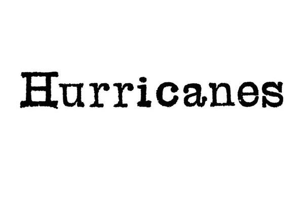 Parola Uragani Una Macchina Scrivere Sfondo Bianco — Foto Stock
