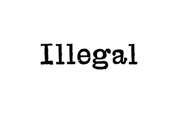 The word Illegal from a typewriter on a white background