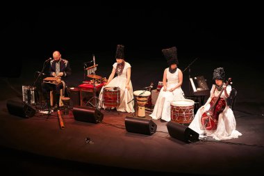 DakhaBrakha at solo concert at theater clipart