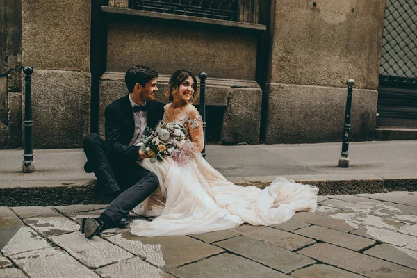 Bride and groom at Italian wedding in middle of Milan, Italy