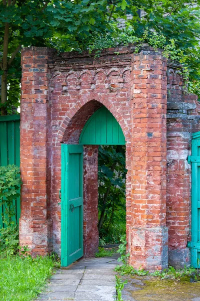 open door in a brick arch