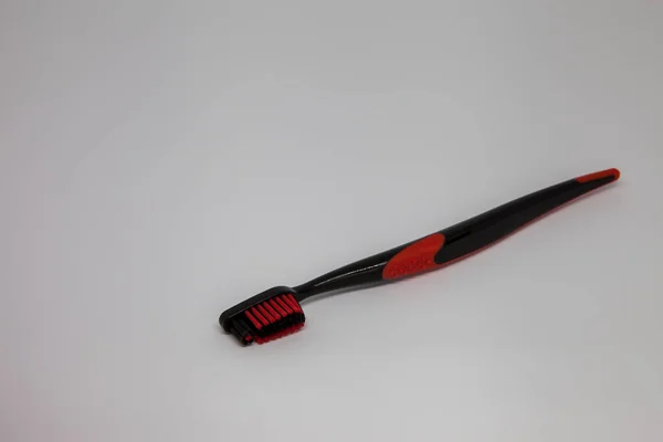 Black Red Toothbrush Table — Stock Photo, Image