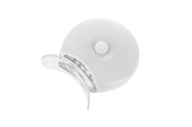 Diş kliniğinde diş beyazlatma cihazı izole