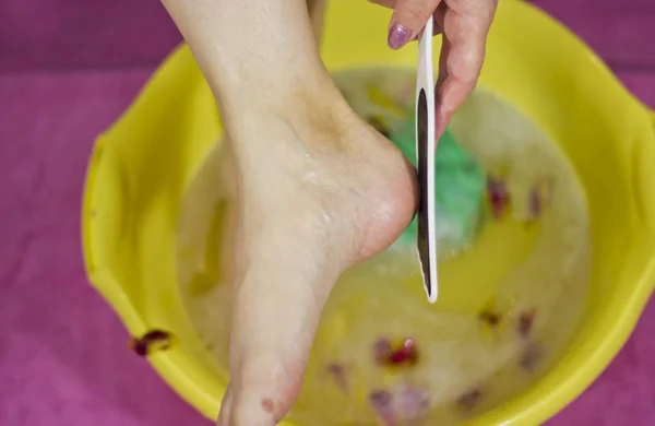 Woman caring for feet. — Stock Photo, Image