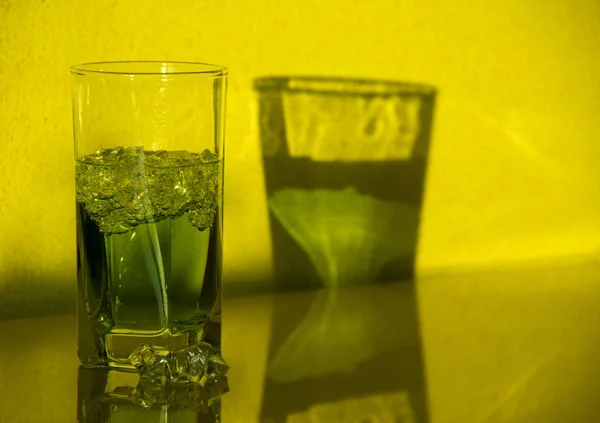 A glass of tarragon in the sunlight — Stock Photo, Image