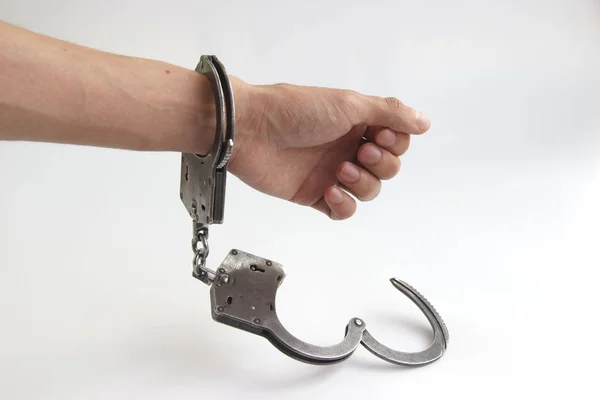 Prisoner with his hands chained isolated on white background — Stock Photo, Image