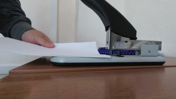 Office work, bond paper stapler — Stock Video