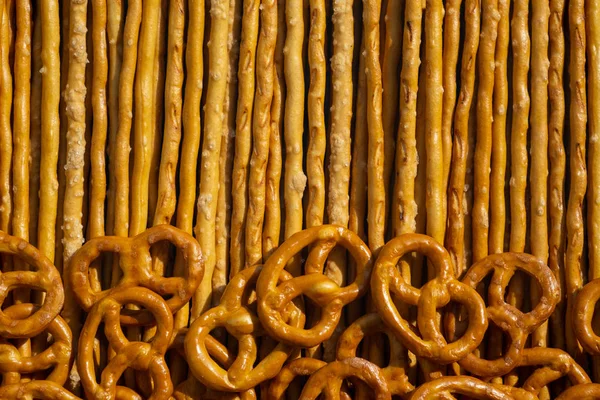 Drying, donut and straws with salt. Food background. — Stock Photo, Image