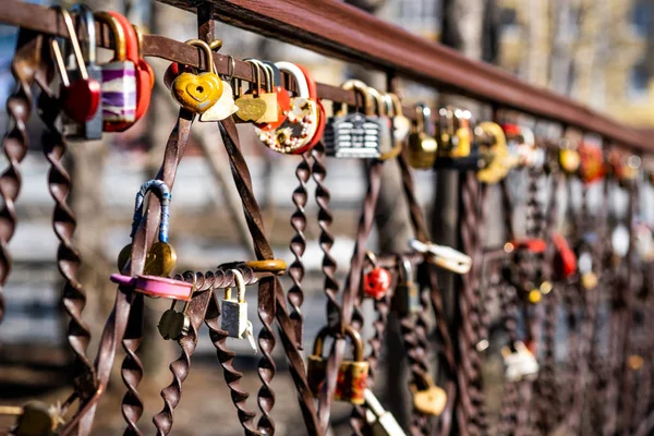 Lock up love. Traditions. Bridge with a lock of love and happine