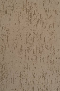 Uzunlamasına koyu çizgileri olan kahverengi arka plan.