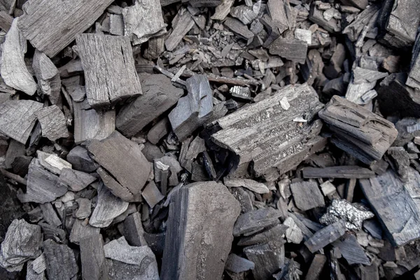 Carvão negro. Peças grandes e pequenas. Close-up . — Fotografia de Stock