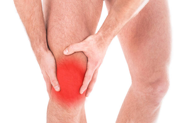 Man with knee pain over white background