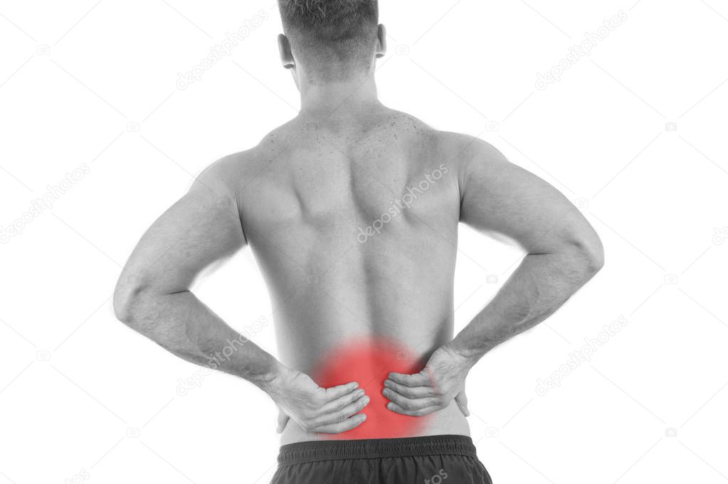 Back view of a shirtless man with lower back pain