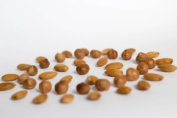 Puñado Nueces Sobre Fondo Blanco Almendras Avellanas —  Fotos de Stock