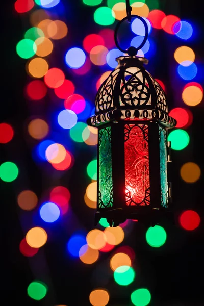 Low light studio set up shot of lighted lantern - showing ramada