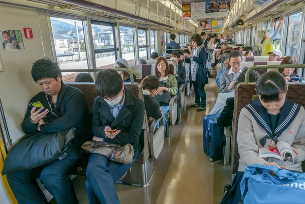 OSAKA, JAPAN-NOV 10, 2018: General view of commuters inside a tr — Stock Photo, Image